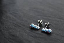 Load image into Gallery viewer, Triple Blue Opalique Claw Set Studs
