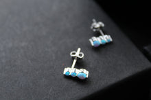 Load image into Gallery viewer, Triple Blue Opalique Claw Set Studs
